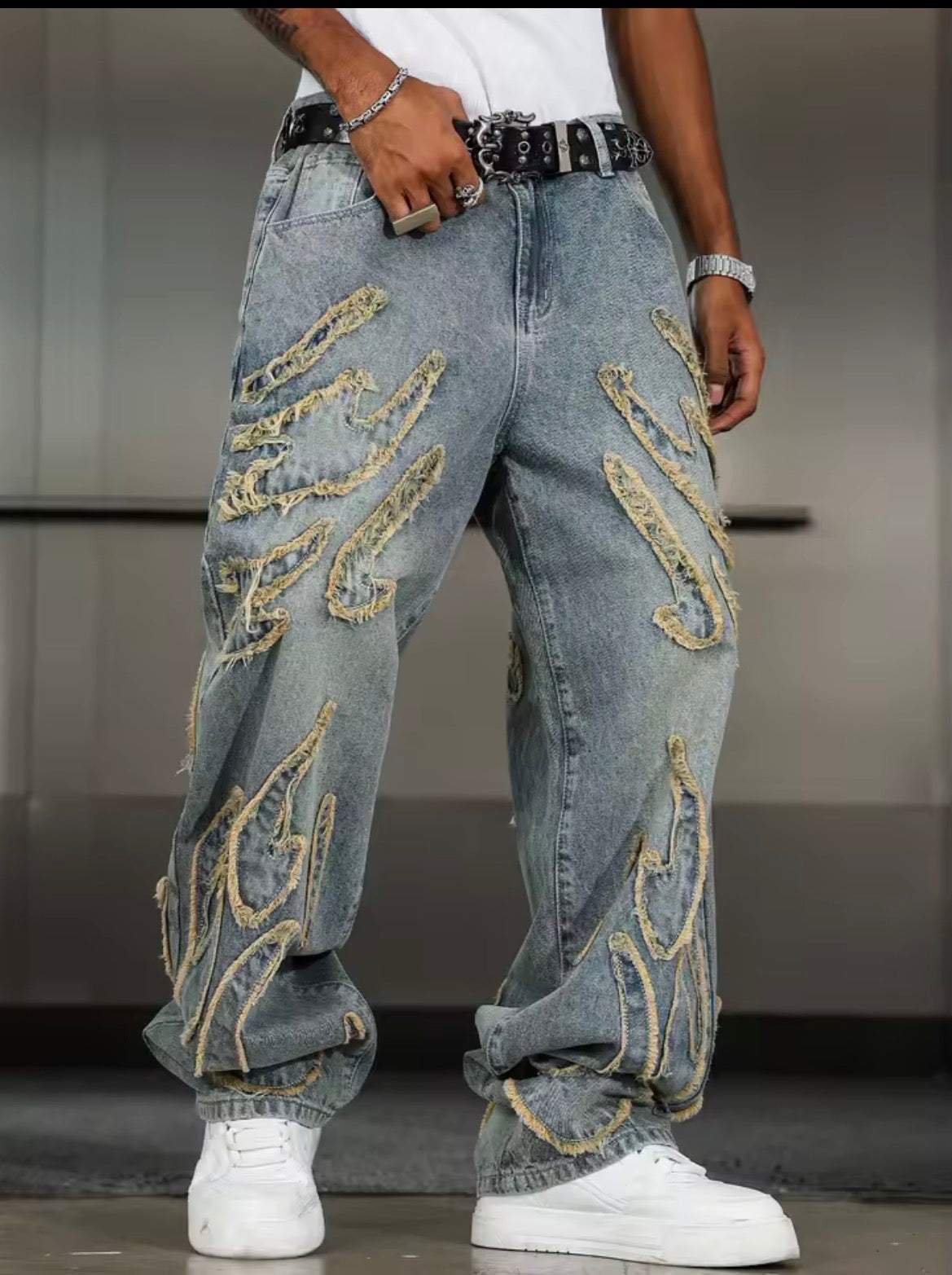 Men’s distressed blue jeans